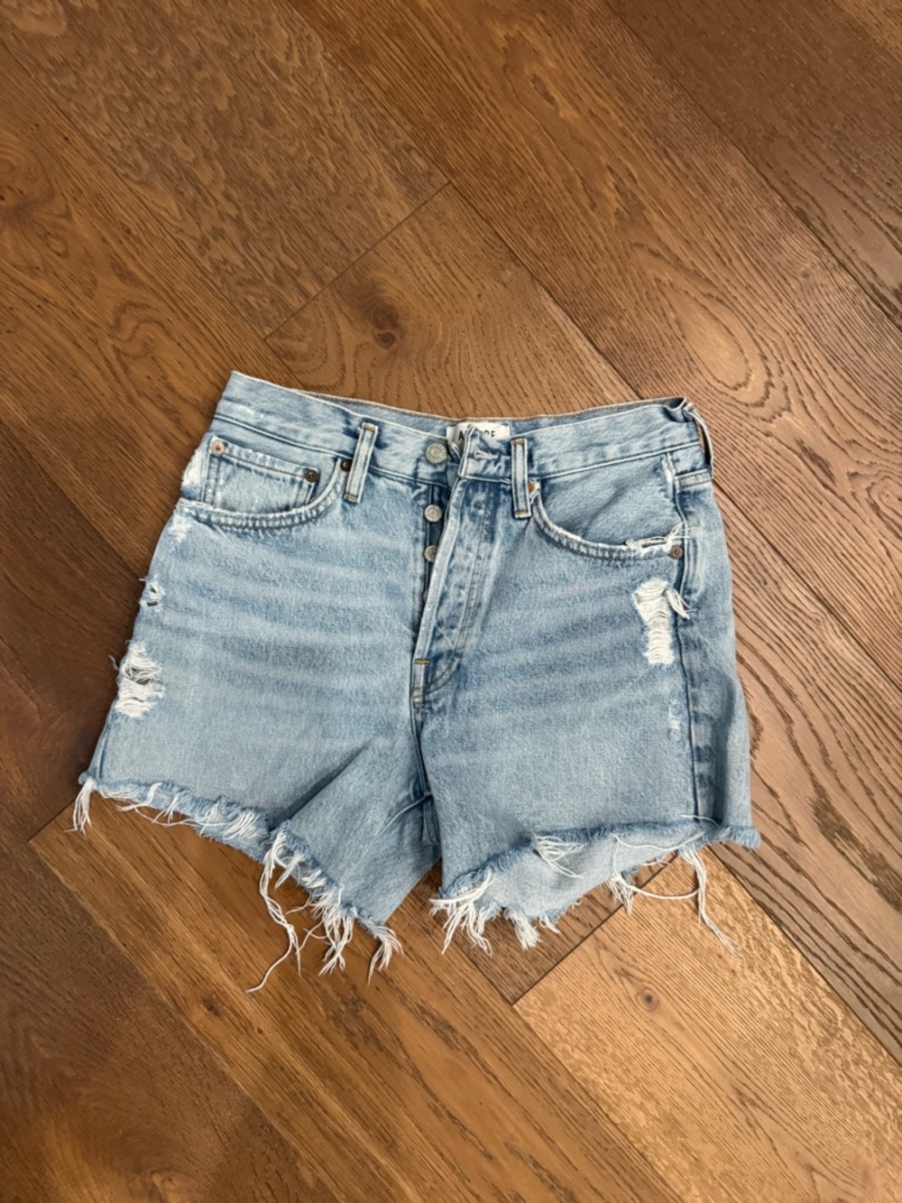 Agolde Light Blue Distressed Denim Cutoff Shorts